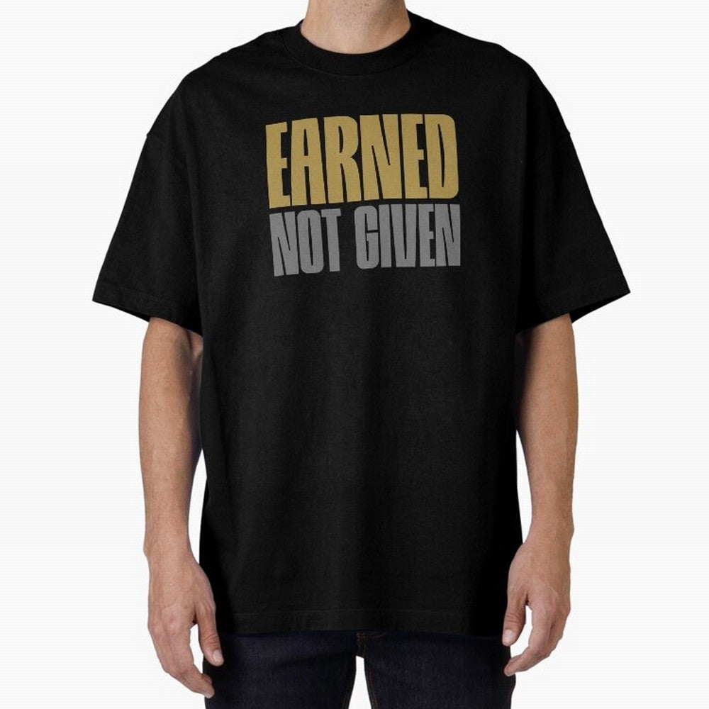 Earned not given Oversized T-Shirt Celebrate Every Goal in Global Football Passion for FIFA World Cup 2026, Filled with Messi, CR7 and Mbappe, Spain, Championship Spirit, Famous Goals, Roaring Crowds and International Football Unity; Ideal for