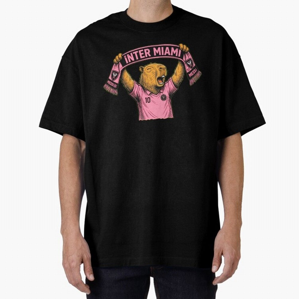 Capybara Inter Miami Fan Celebrating ¨C Funny Soccer Illustration with Scarf Oversized T-Shirt Bring Stadium Energy to FIFA World Cup 2026 USA Canada Mexico Featuring Messi and Cristiano Ronaldo, Portugal Energy, Global Supporter Spirit, Legendary
