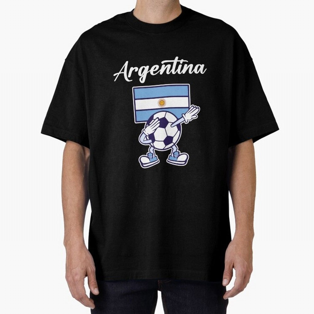 ARGENTINA - Dabbing Football Soccer Ball - ARGENTINA Oversized T-Shirt Bring Match Day Fire to FIFA World Cup 2026 Group Stage Spirit, Highlighting England and Germany, Messi and Cristiano Ronaldo, Retro Football Energy, Iconic Rivalries, Trophy